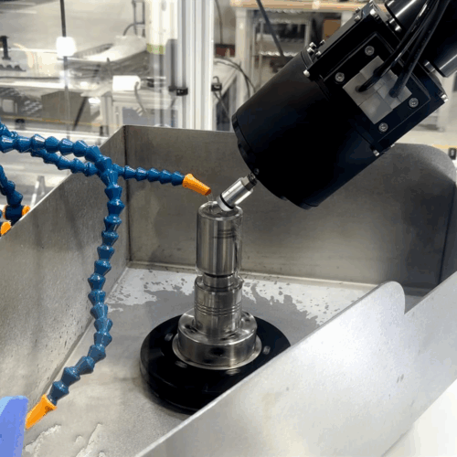 Revel performing controlled and repeatable bevel formation on round optics with cup tool